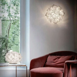 SLAMP Veli Couture като аплик за стена и настолна лампа в модерен интериор.