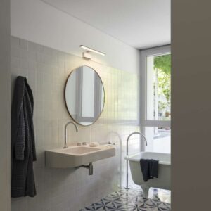 Белият аплик Alma AP D81 е показан над кръгло огледало - Ideal Lux 225029