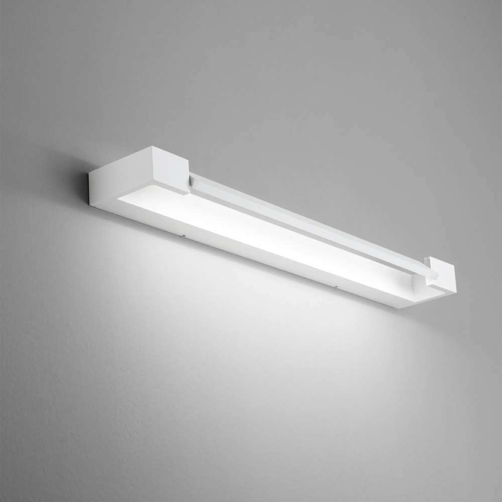 Белият вариант Balance AP D60 е показан включен на сива стена - Ideal Lux 287577