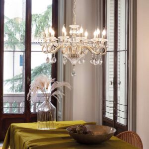 Ideal Lux Negresco SP10 087771 в интериор Златист полилей Ideal Lux Negresco SP10 087771 с десет рамена над трапезна маса